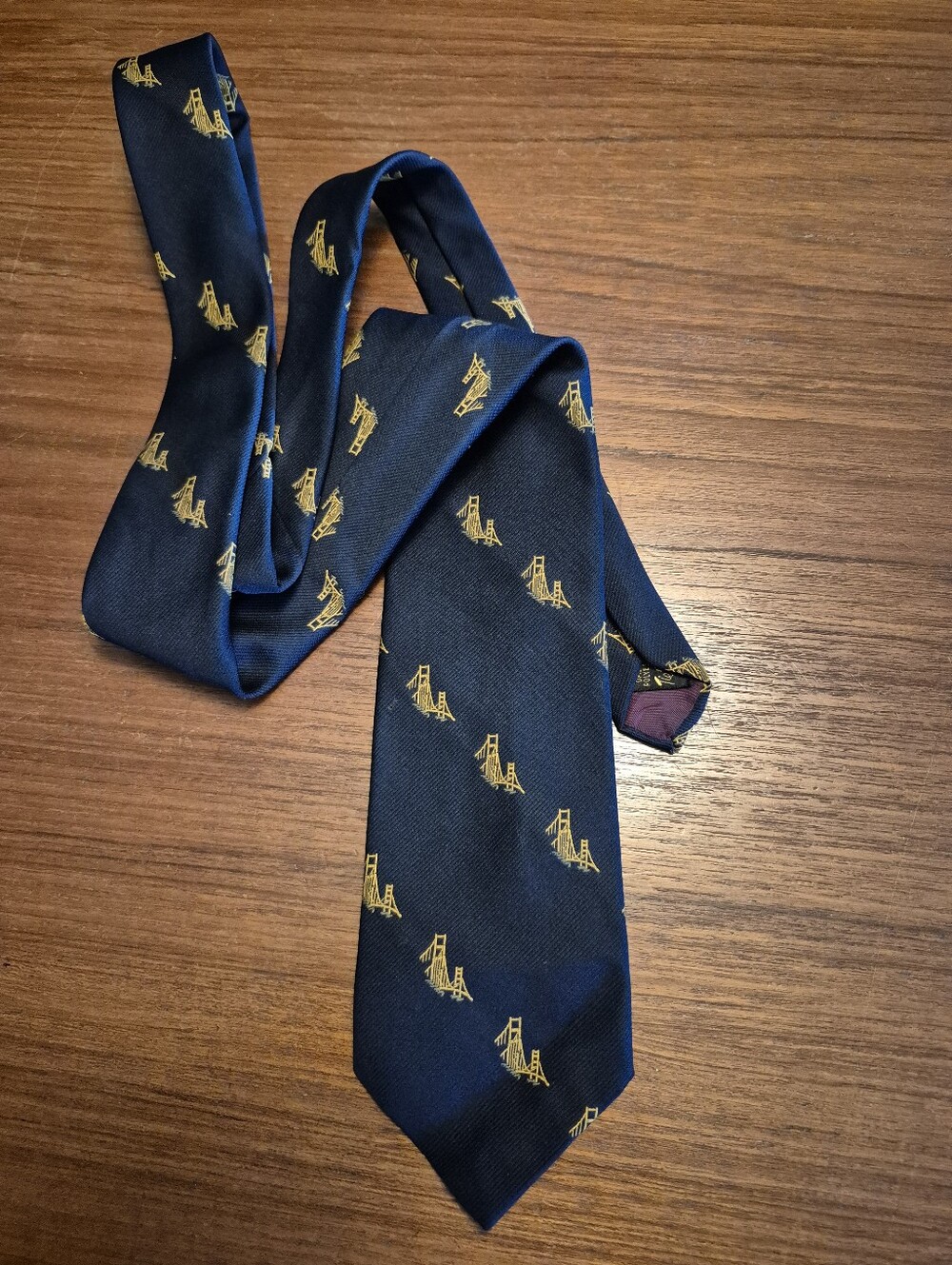 Vintage 69s Navy Tie with Gold Bridge Motif
